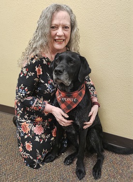 Sherry Magness and her facility dog Emmie